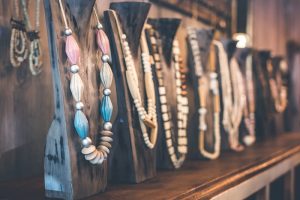 Women beads and necklace in jewerly market. Bali island.